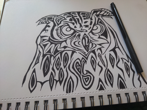 Stylised black ink drawing of an owl