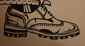 Black and white pen and ink drawing of an enormous shoe
